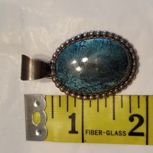 Turquoise and silver slide.